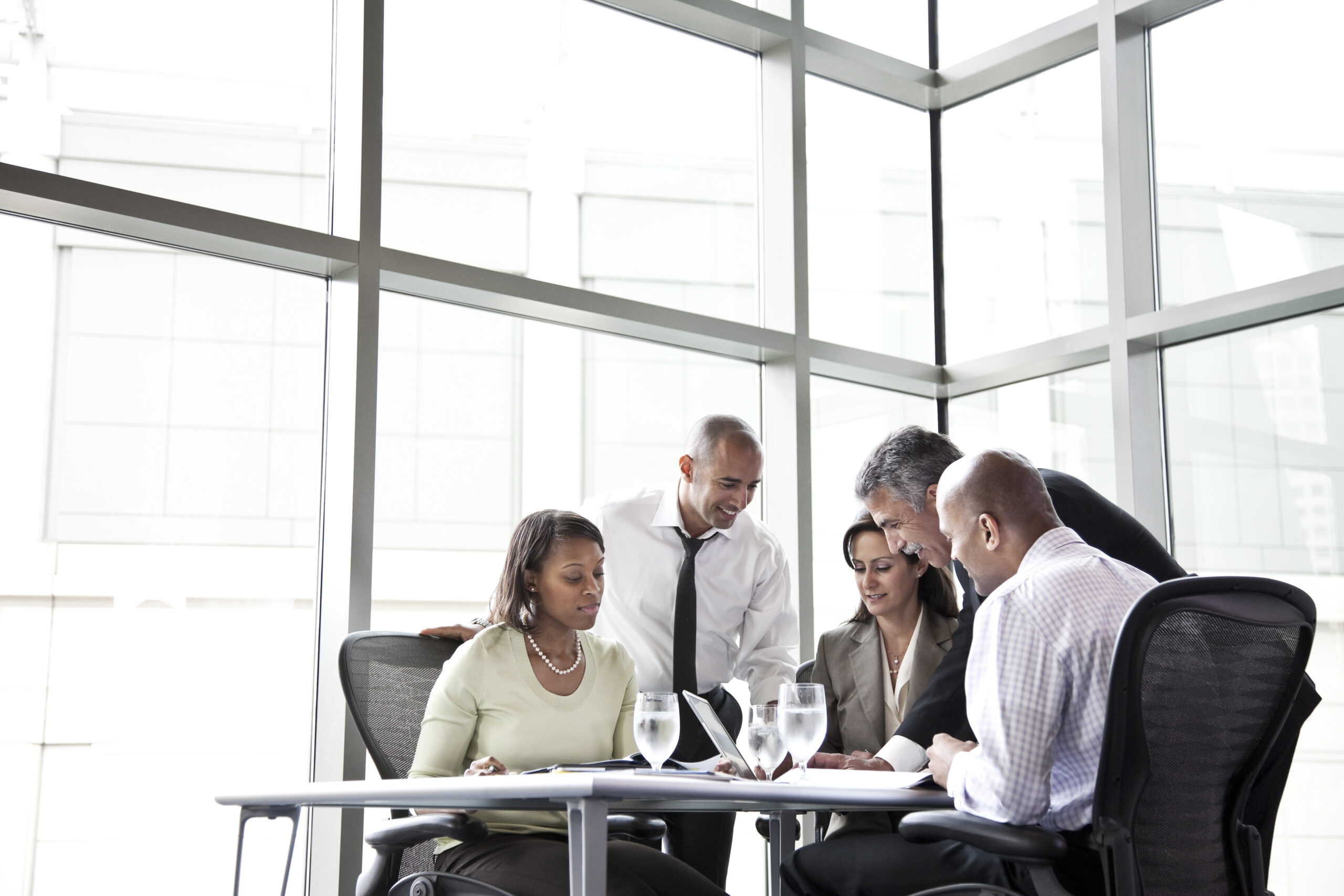 business people in a meeting at a conference table 2025 04 04 03 23 57 utc scaled.jpg